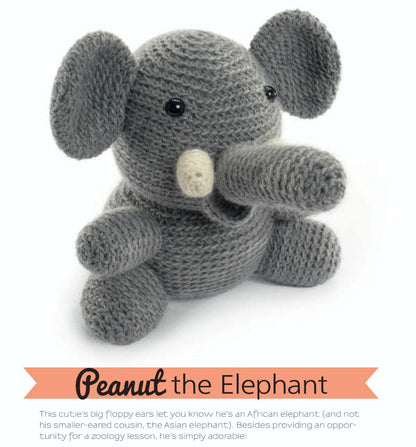 Gray crocheted amigurumi elephant with large ears and a cream-colored tusk sitting on white background.